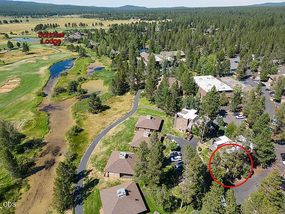 17654 Pinnacle Lane, Unit 16 Sunriver, OR 97707 - Photo 2 of 28 an aerial view of residential houses with outdoor space