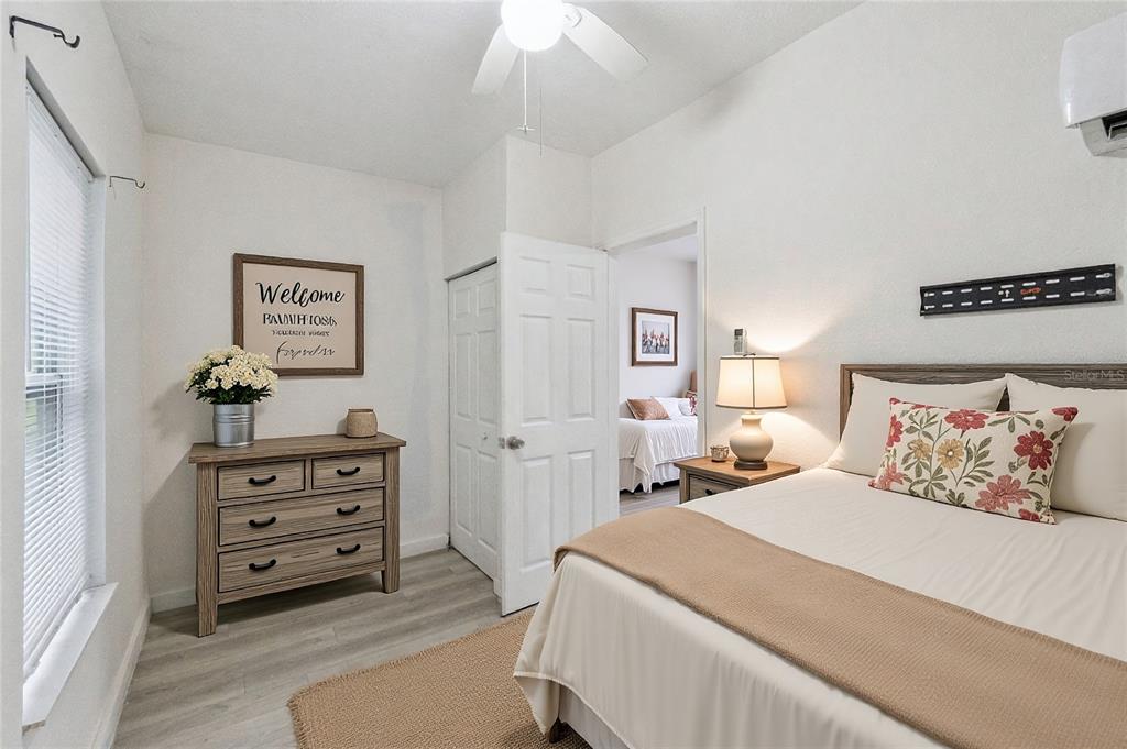 1416 6th Street St. Cloud, FL 34769 - Photo 9 of 13 a bedroom with a bed and a dresser