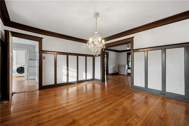 a view of entryway with wooden floor