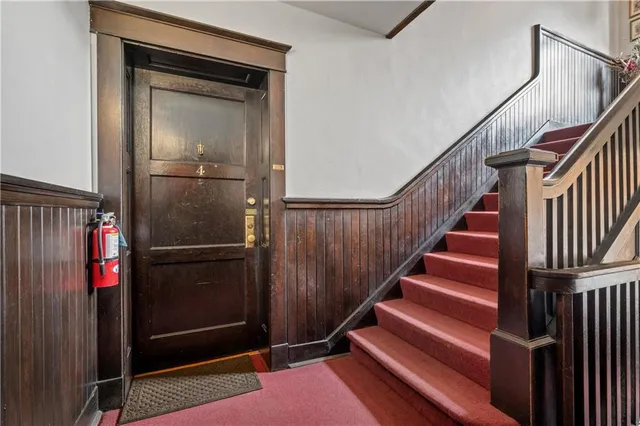 a view of entryway with wooden floor