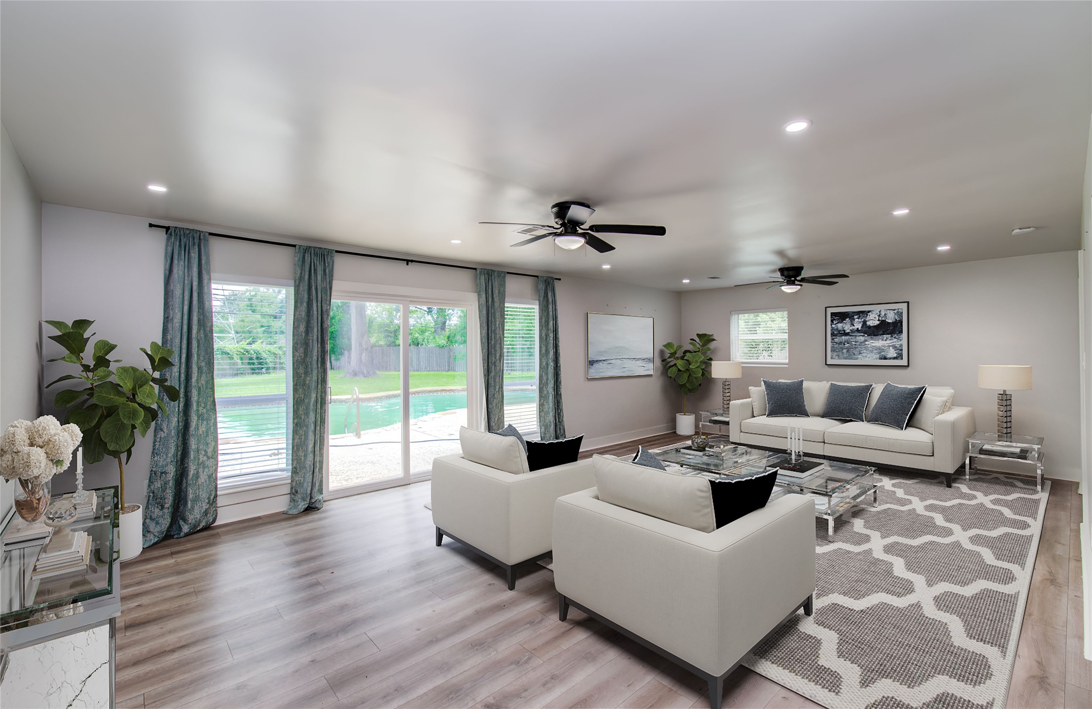 10415 Westray Street Houston, TX 77043 - Photo 22 of 45 a living room with furniture large window and wooden floor