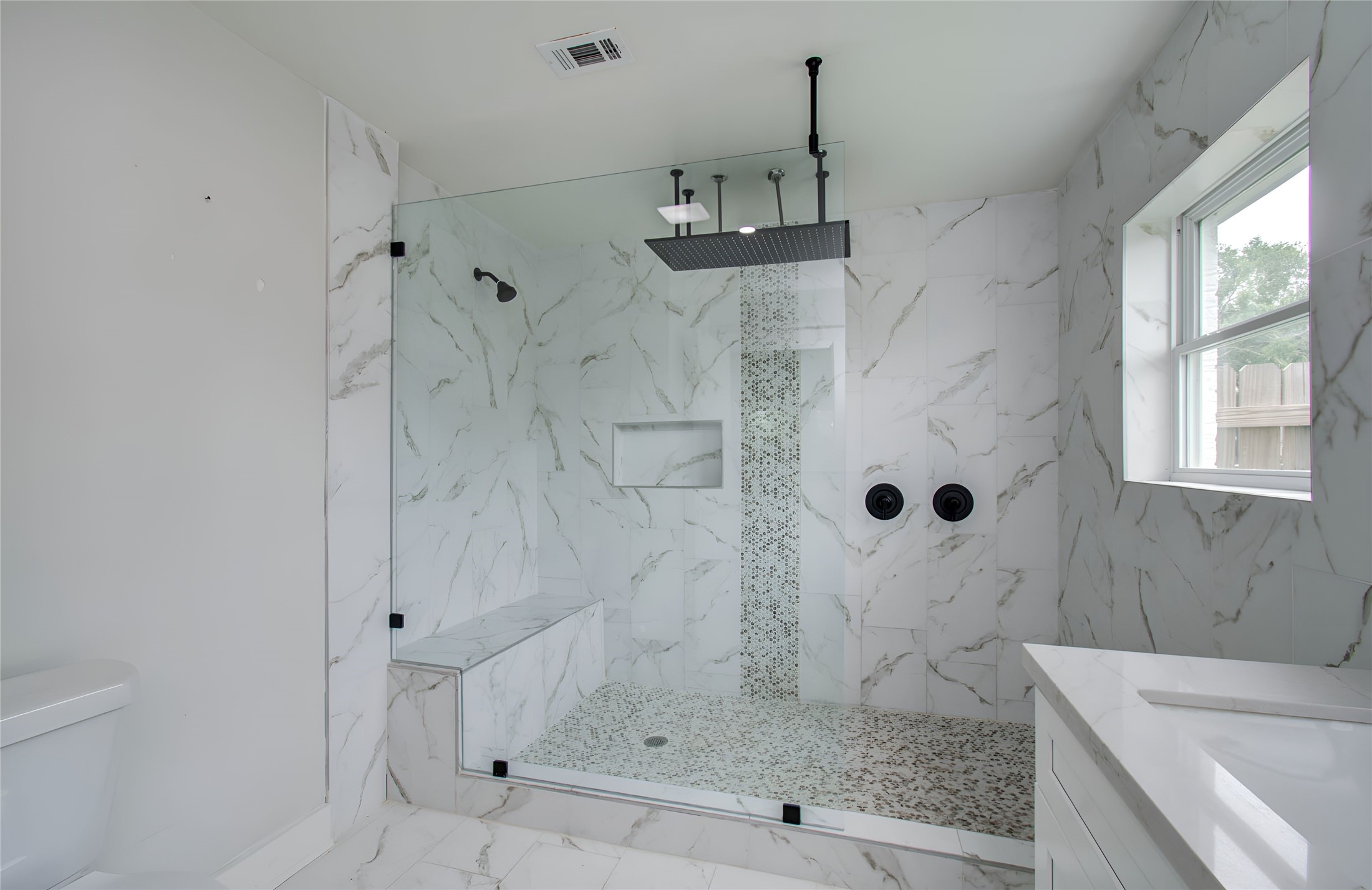 10415 Westray Street Houston, TX 77043 - Photo 41 of 45 a bathroom with a shower and a sink