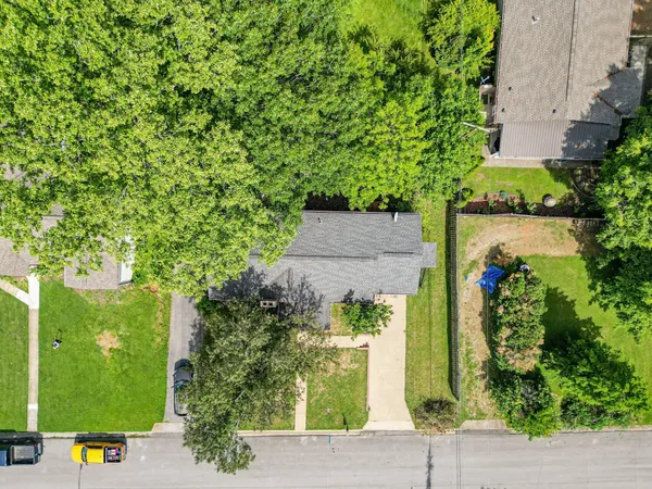 a view of a yard with an outdoor space