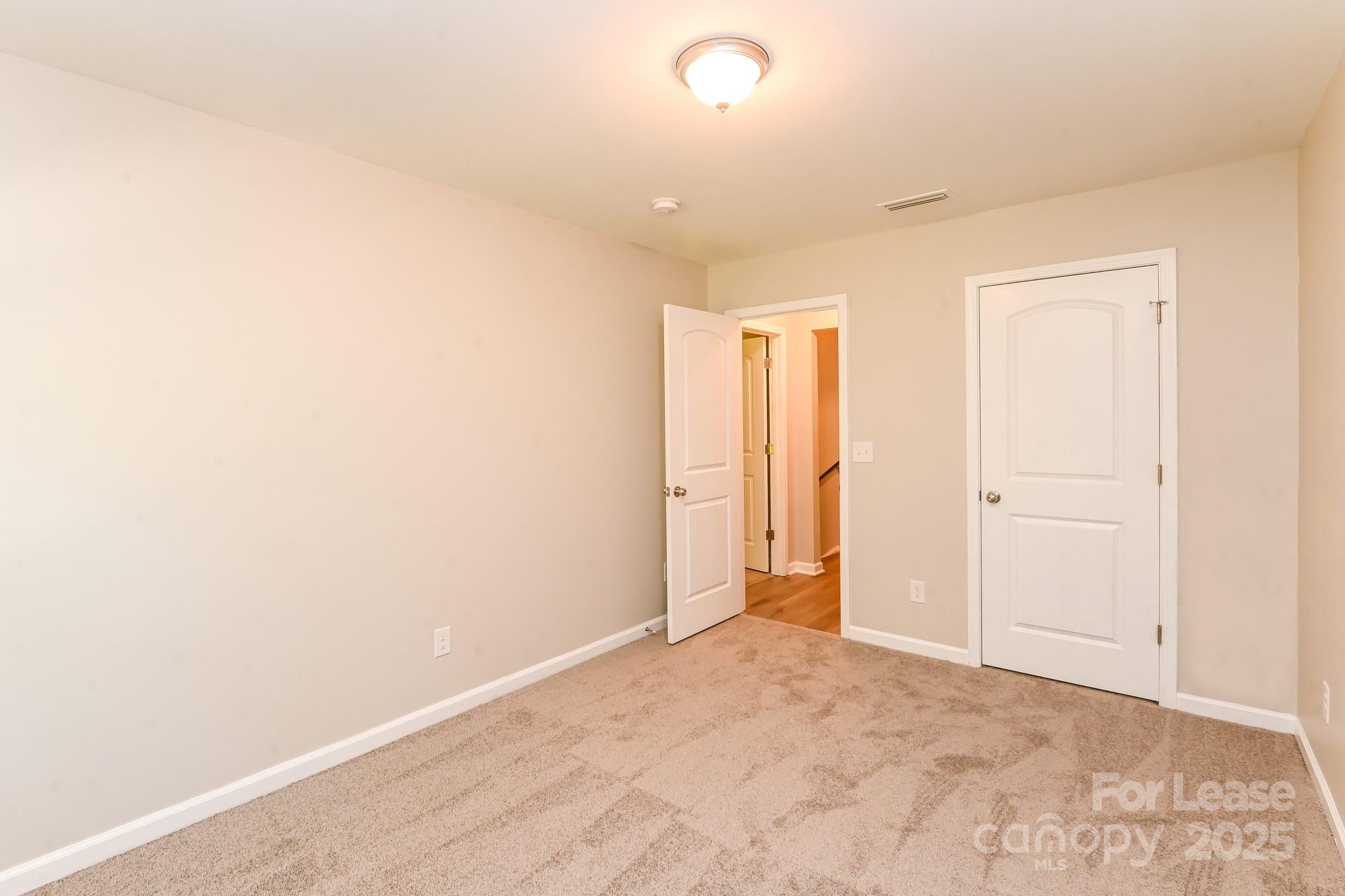 10813 Flintshire Road Mint Hill, NC 28227 - Photo 14 of 17 a view of an empty room
