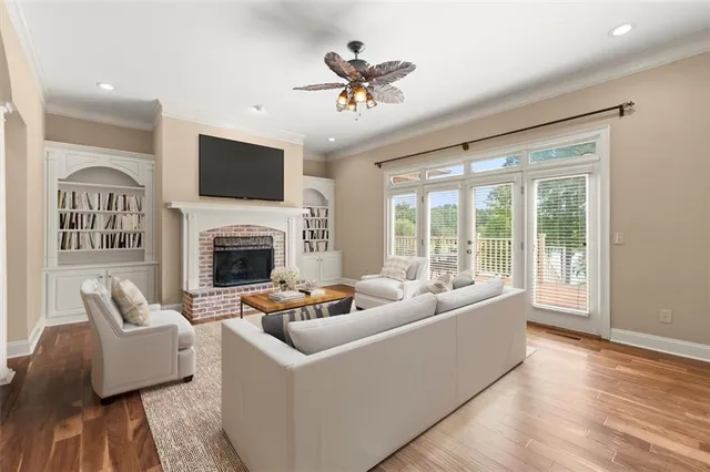 a bathroom with a double vanity sink a toilet and a mirror