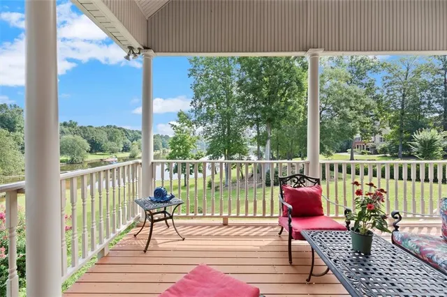 a kitchen with stainless steel appliances granite countertop a stove top oven a sink dishwasher and a refrigerator