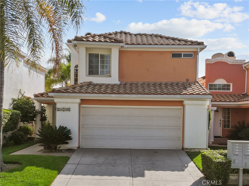25726 Emerson Lane Stevenson Ranch, CA 91381 - Photo 2 of 45 front view of a house with a yard