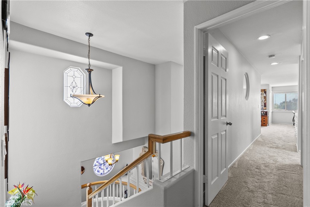 25726 Emerson Lane Stevenson Ranch, CA 91381 - Photo 21 of 45 a view of an entryway with wooden floor