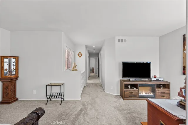 a en suite bathroom with a double vanity sink a mirror and a shower