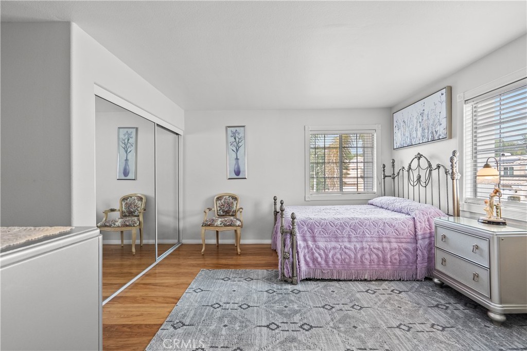 25726 Emerson Lane Stevenson Ranch, CA 91381 - Photo 31 of 45 a bedroom with furniture and a window