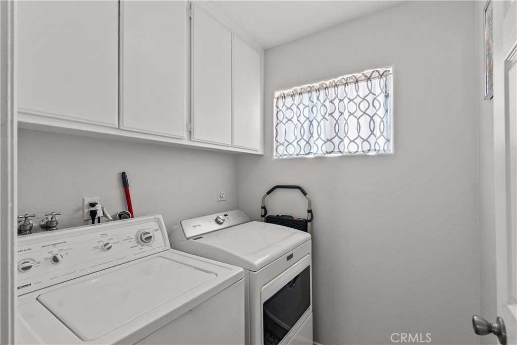 25726 Emerson Lane Stevenson Ranch, CA 91381 - Photo 36 of 45 a utility room with dryer and washer