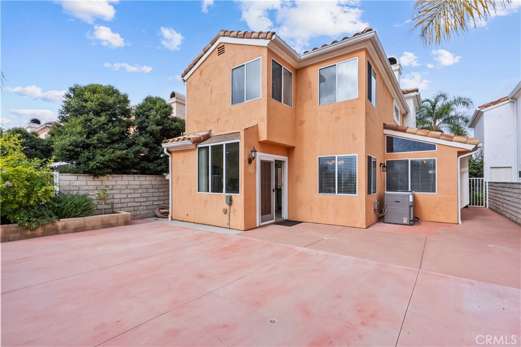 25726 Emerson Lane Stevenson Ranch, CA 91381 - Photo 40 of 45 a view of a house with a yard