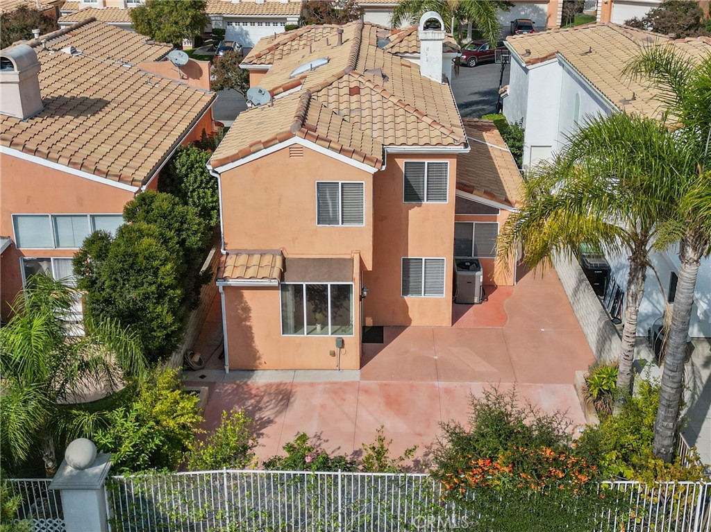 25726 Emerson Lane Stevenson Ranch, CA 91381 - Photo 42 of 45 a view of a house with iron fence