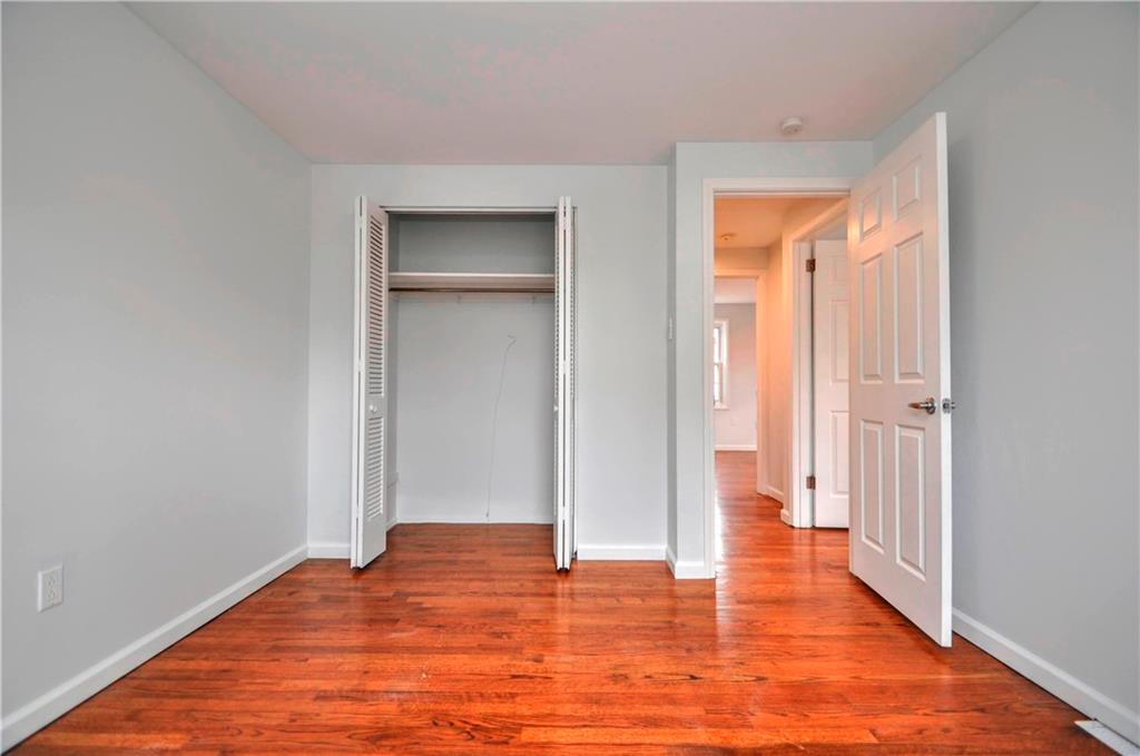 1313 Star Ridge Drive Pittsburgh, PA 15241 - Photo 26 of 36 a view of an empty room with wooden floor and closet