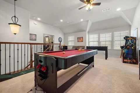 a bed room with bed and window