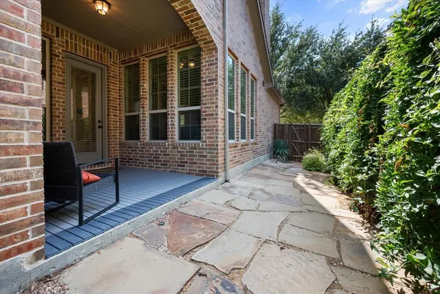a view of house with patio
