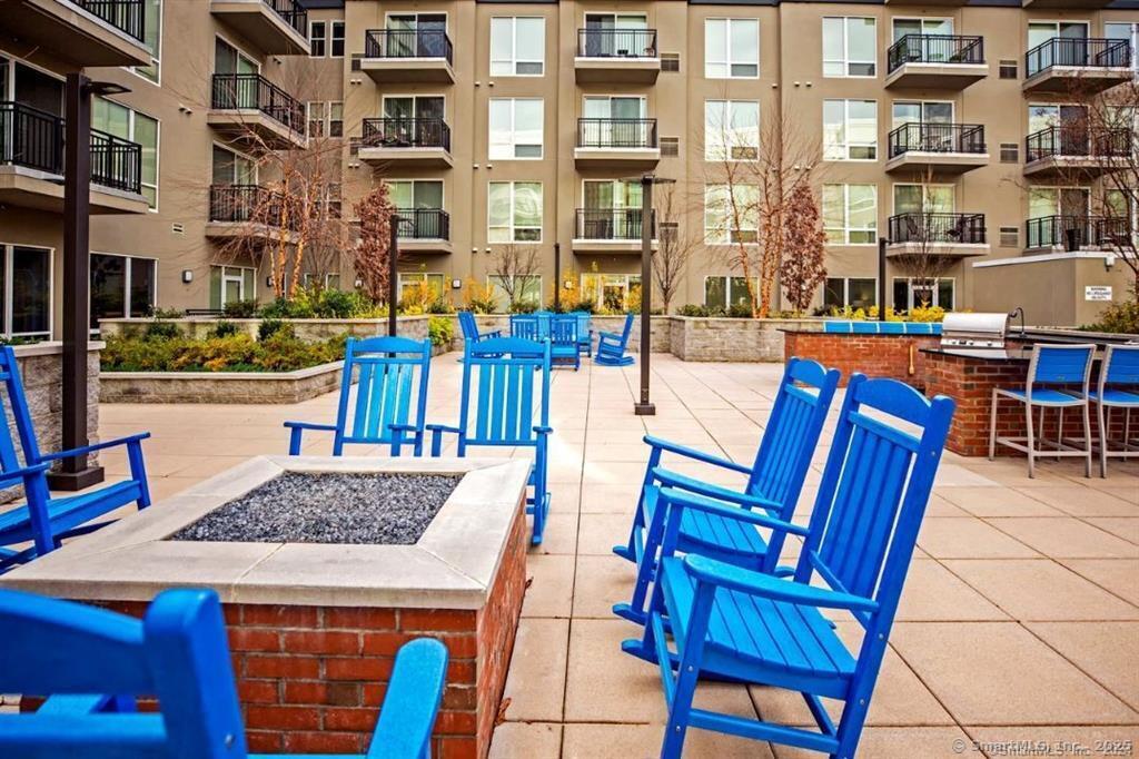 a view of a dining room with furniture and a table