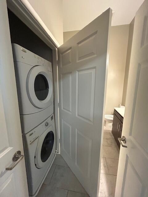 120 A Towne Street, Unit 237 Stamford, CT 06902 - Photo 18 of 20 a utility room with dryer and washer