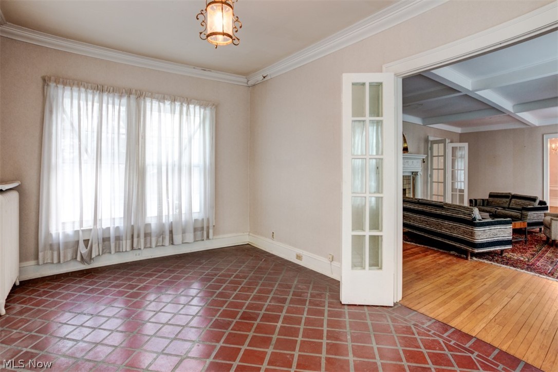Clay tile flooring warms the sunroom...
