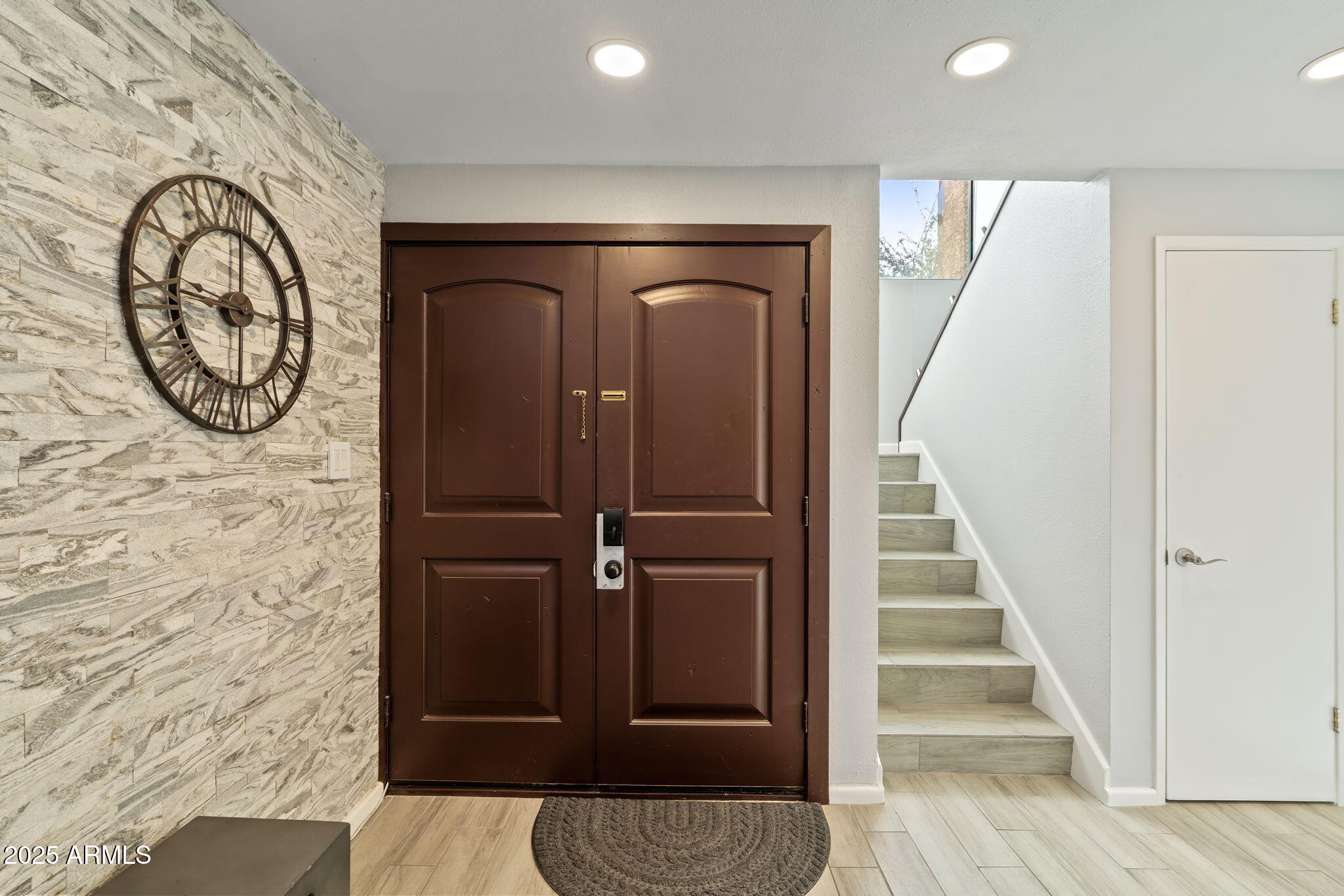 7401 North Scottsdale Road, Unit 24 Paradise Valley, AZ 85253 - Photo 5 of 47 Front door and stairs w storage