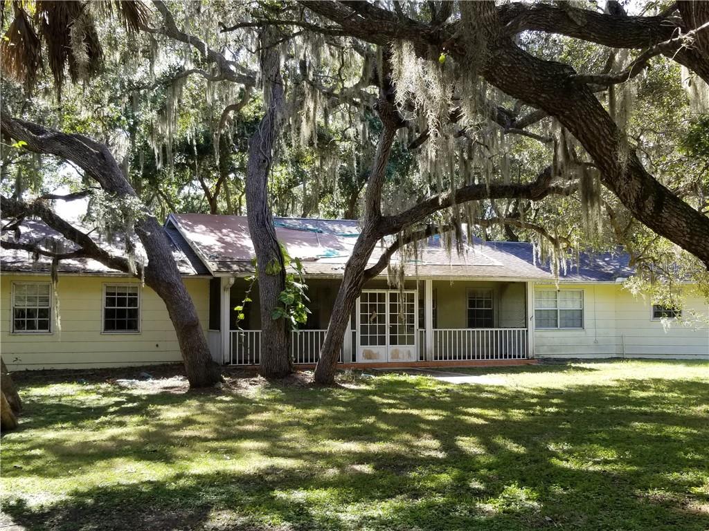 807 Gull Road Venice, FL 34293 - Photo 1 of 1 a view of a house with a tree in the yard