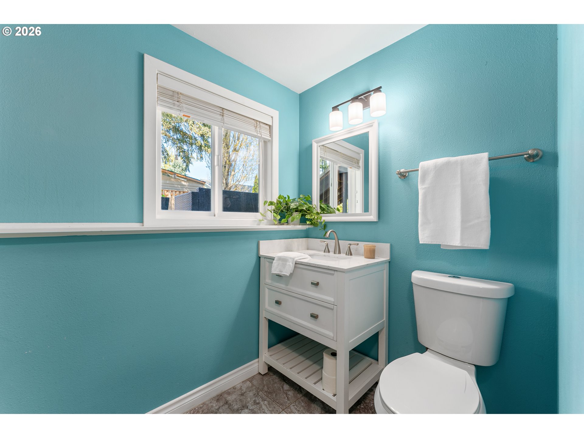 12785 Southwest Percheron Lane Beaverton, OR 97008 - Photo 11 of 42 a bathroom with a toilet sink and mirror