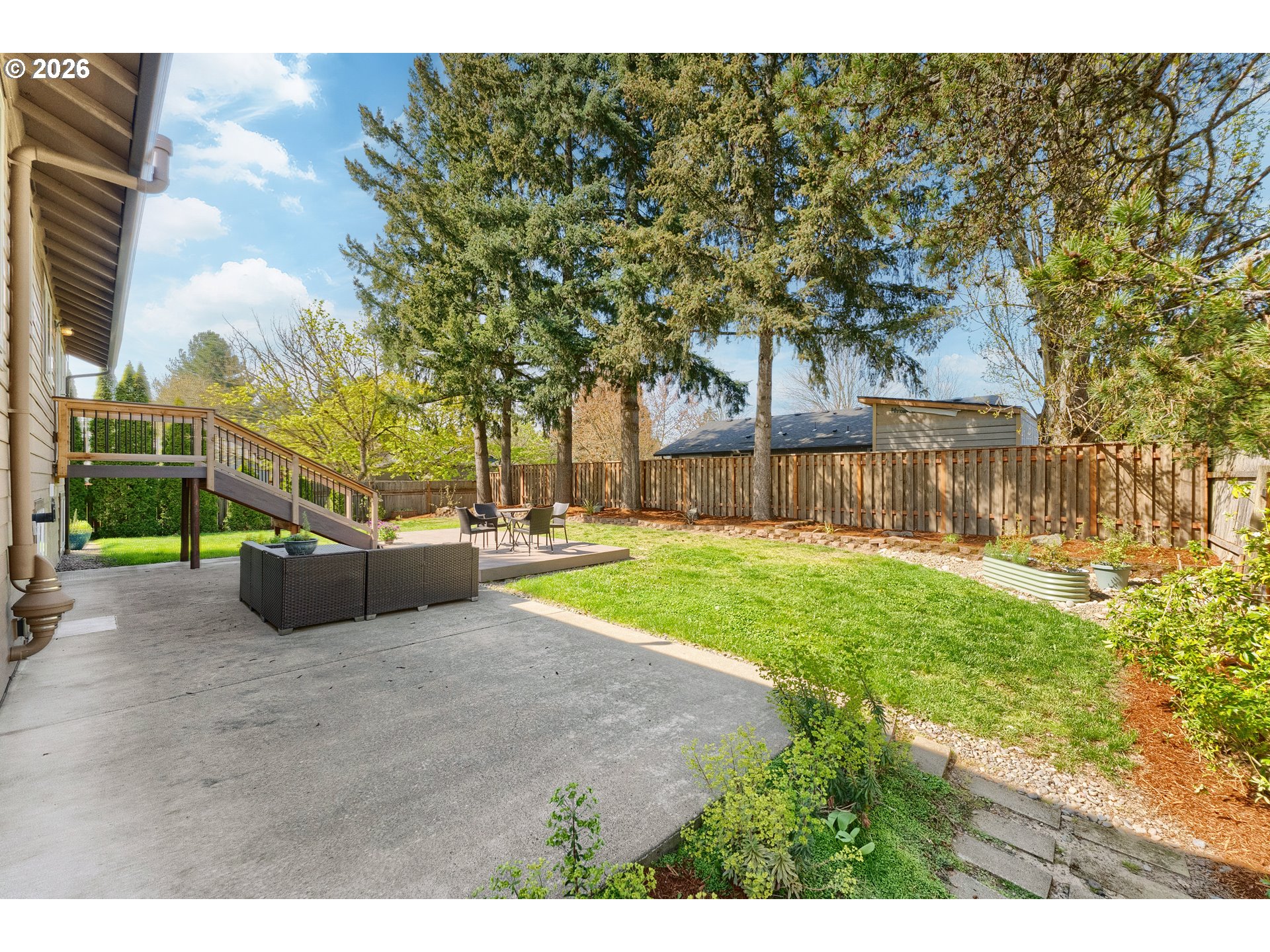 12785 Southwest Percheron Lane Beaverton, OR 97008 - Photo 12 of 42 a swimming pool with outdoor seating and yard