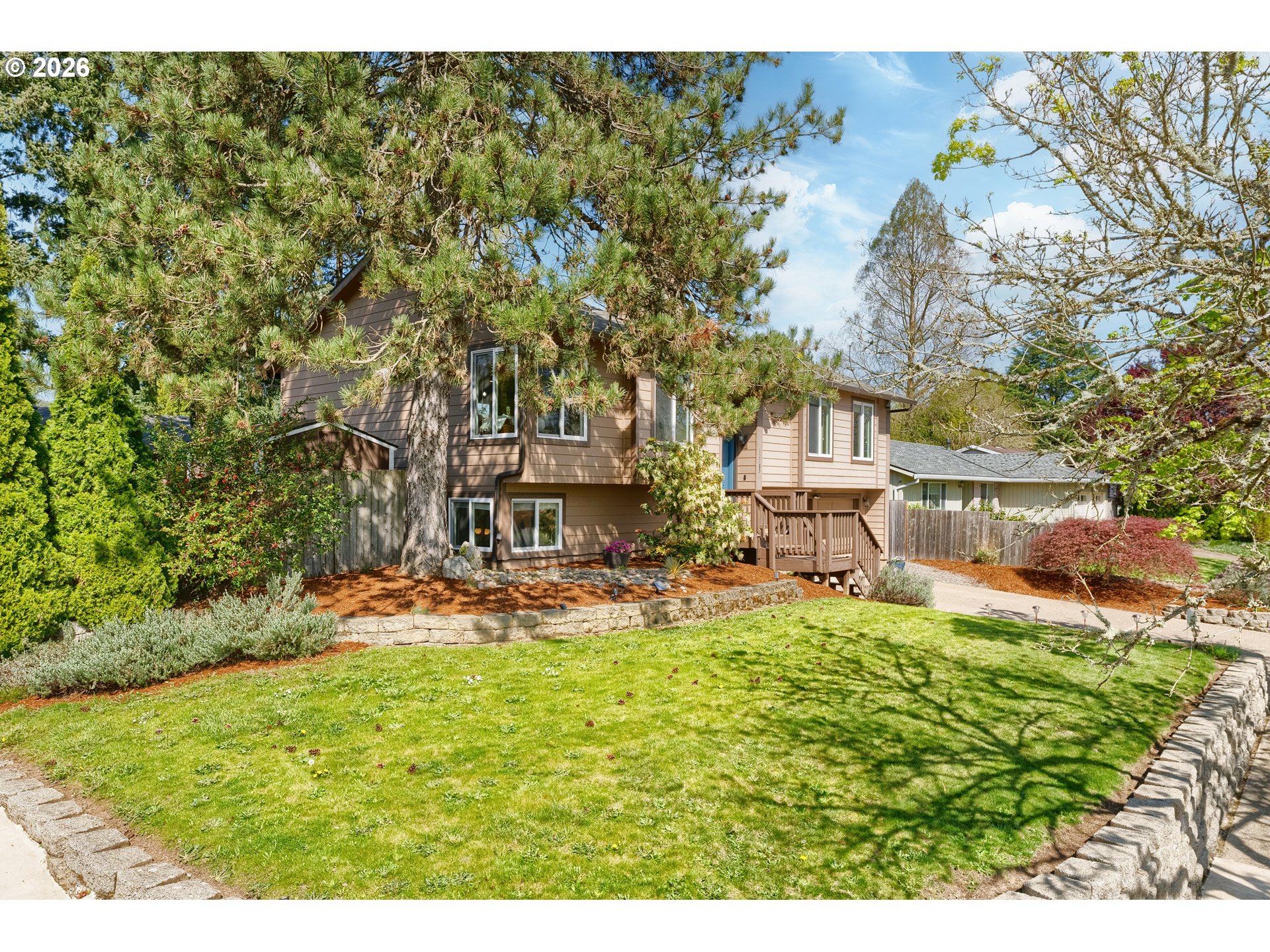 12785 Southwest Percheron Lane Beaverton, OR 97008 - Photo 14 of 42 a view of a house with a yard
