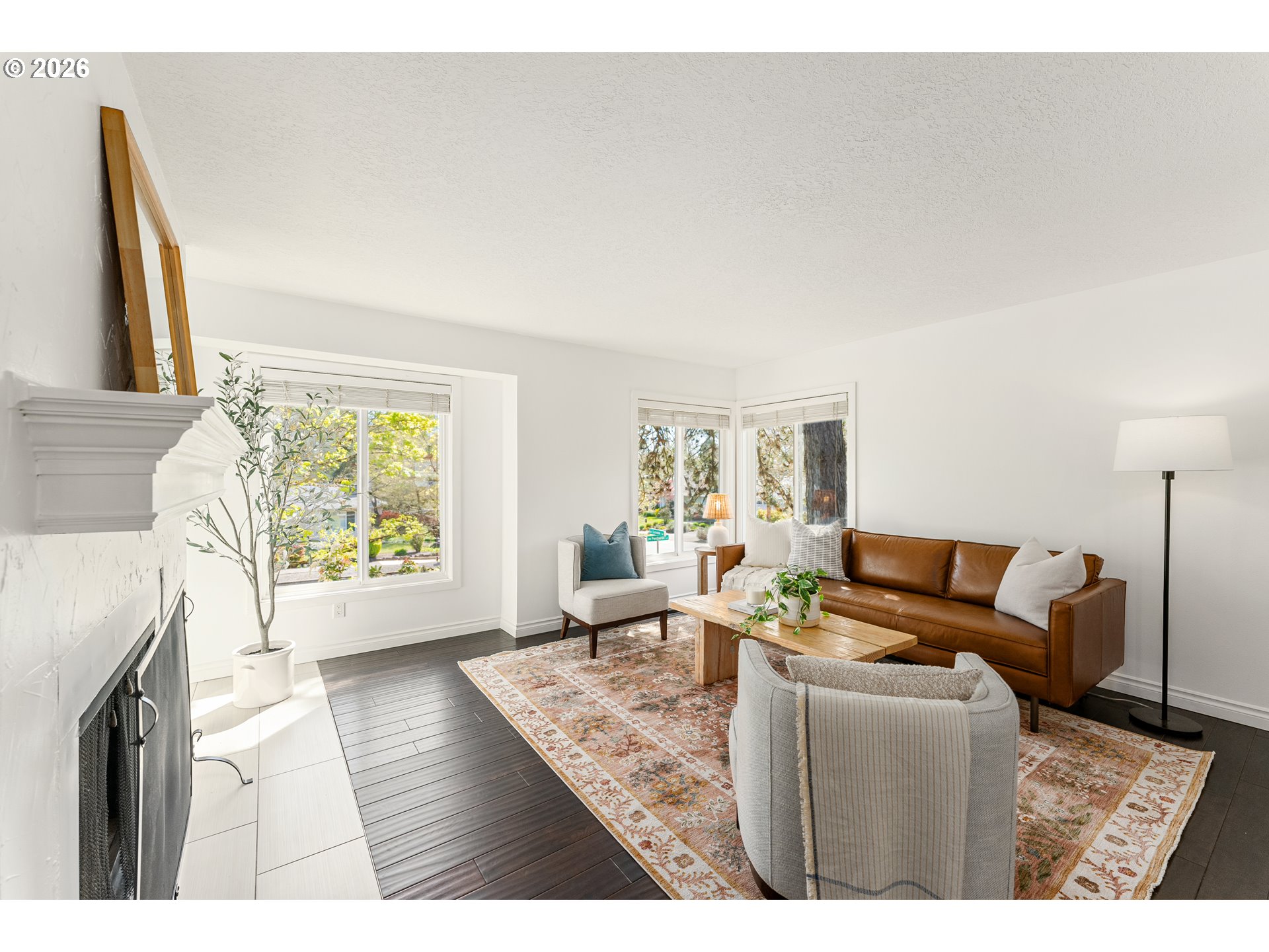 12785 Southwest Percheron Lane Beaverton, OR 97008 - Photo 15 of 42 a living room with furniture and a large window