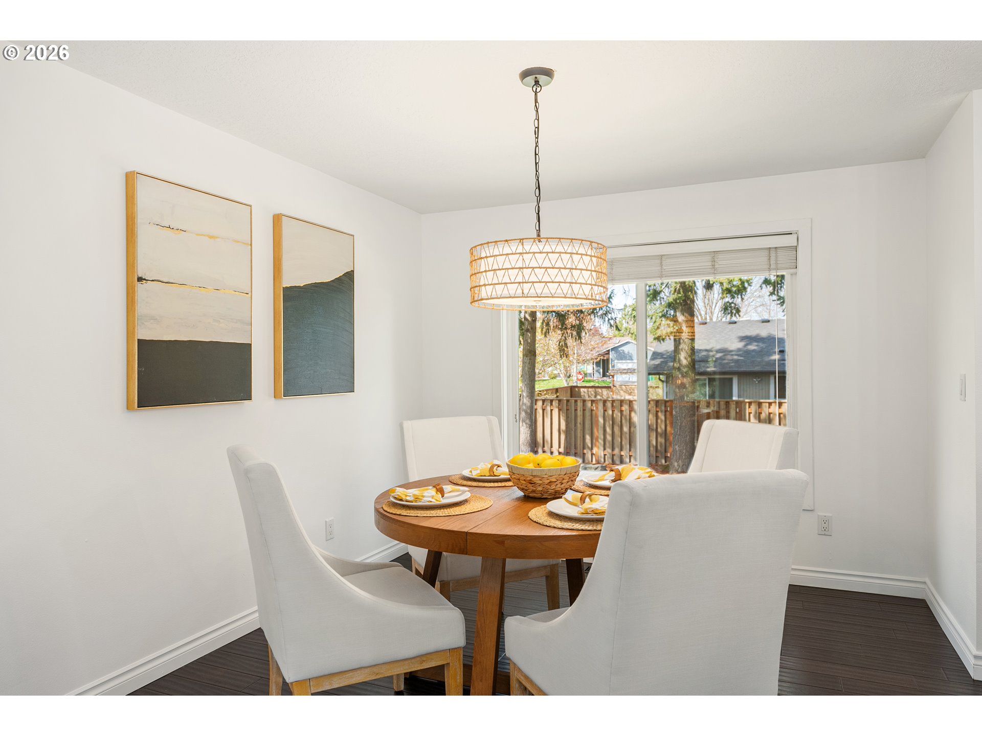 12785 Southwest Percheron Lane Beaverton, OR 97008 - Photo 17 of 42 a view of a dining room with furniture and chandelier