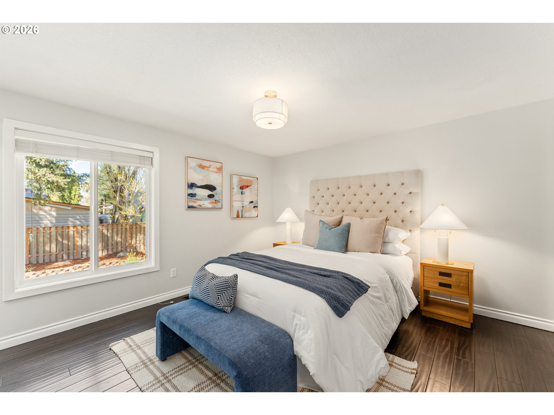 12785 Southwest Percheron Lane Beaverton, OR 97008 - Photo 21 of 42 a bedroom with a bed and a window