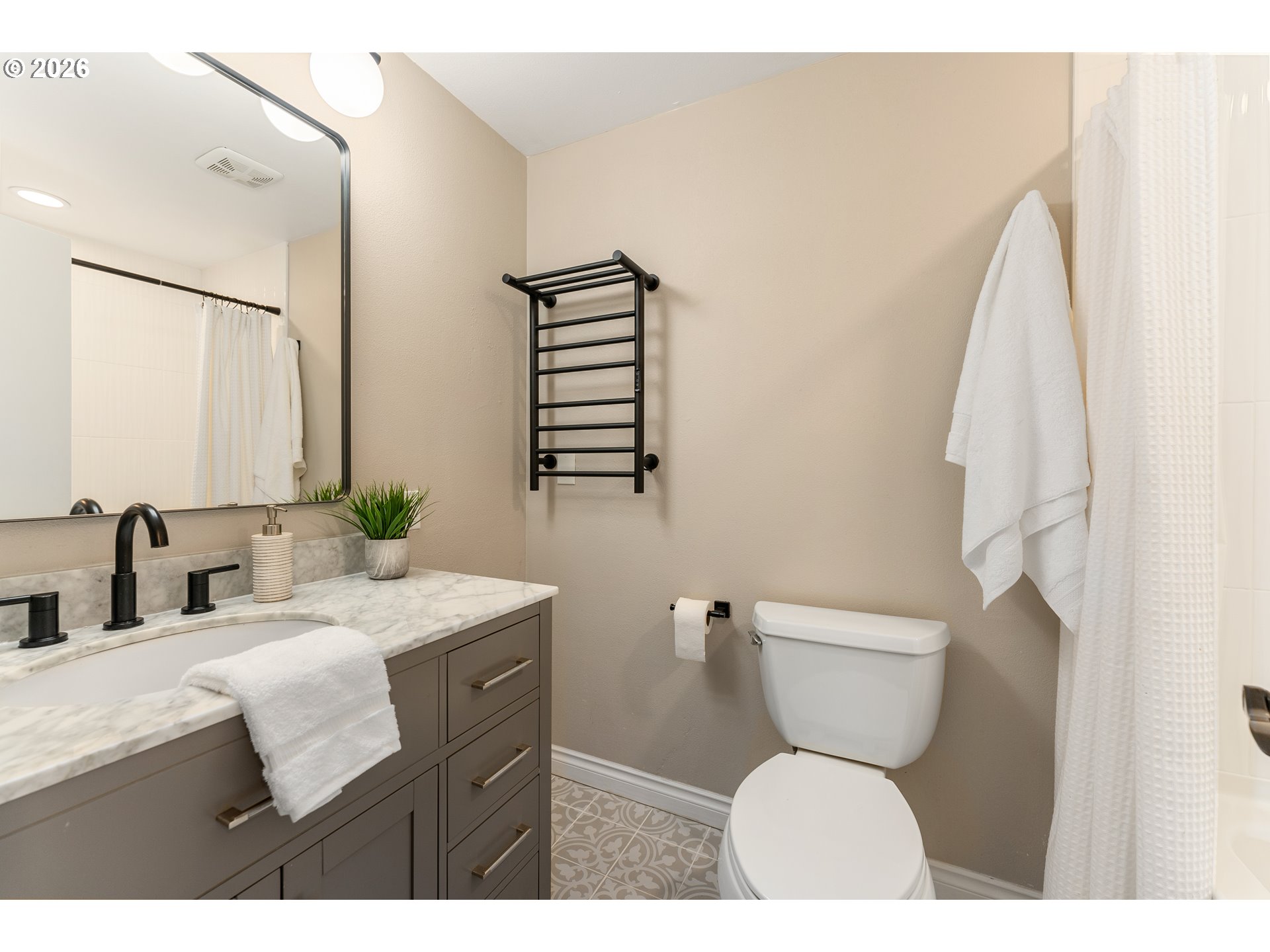 12785 Southwest Percheron Lane Beaverton, OR 97008 - Photo 24 of 42 a bathroom with a sink toilet and mirror
