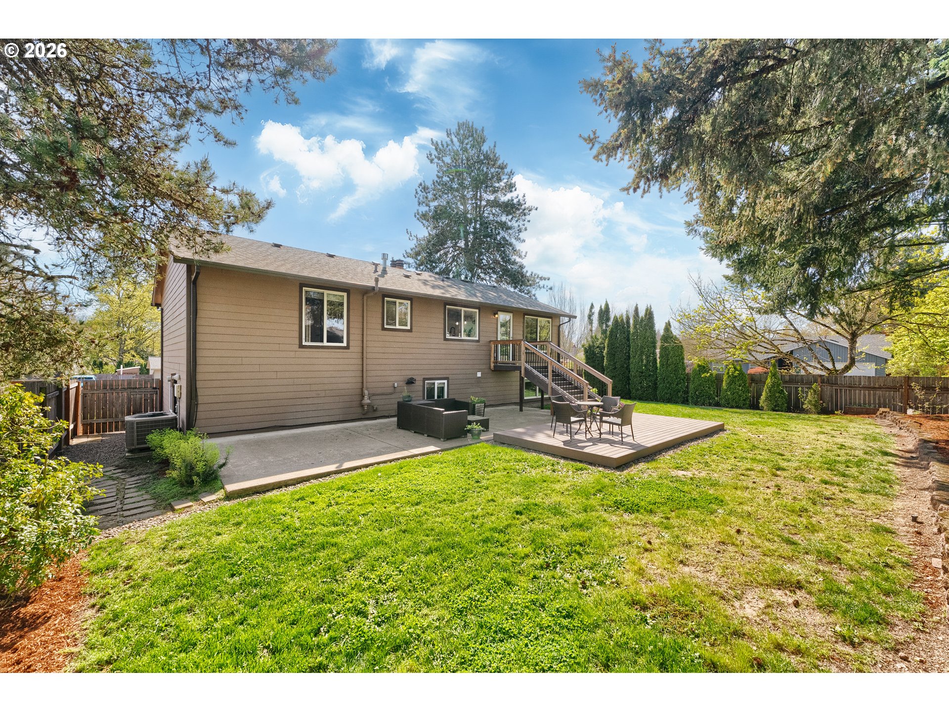 12785 Southwest Percheron Lane Beaverton, OR 97008 - Photo 34 of 42 a view of a backyard with sitting area