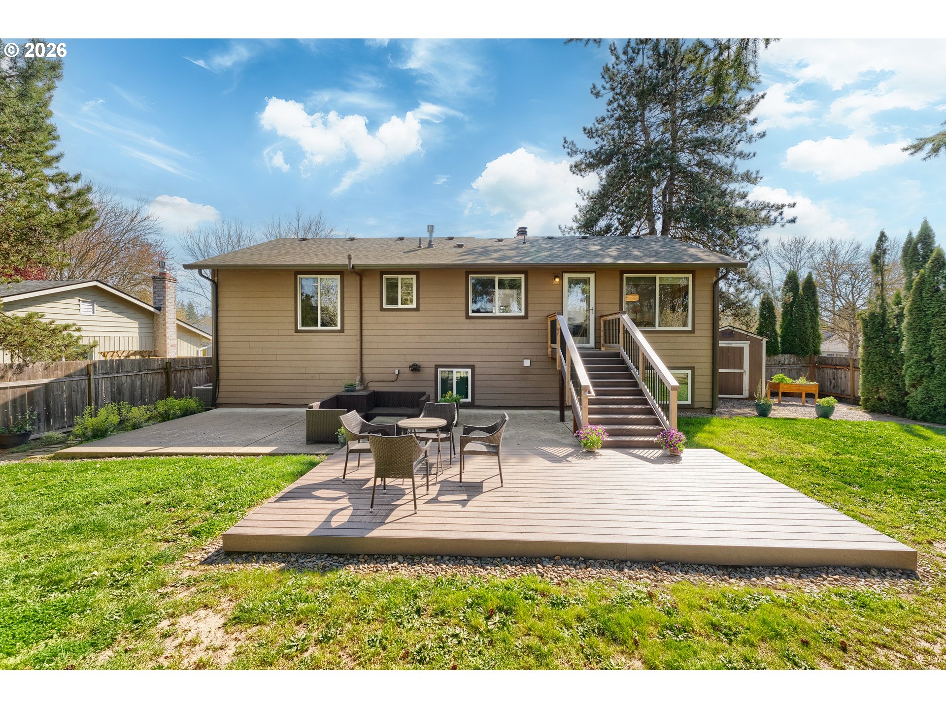 12785 Southwest Percheron Lane Beaverton, OR 97008 - Photo 35 of 42 a view of a house with backyard and sitting area
