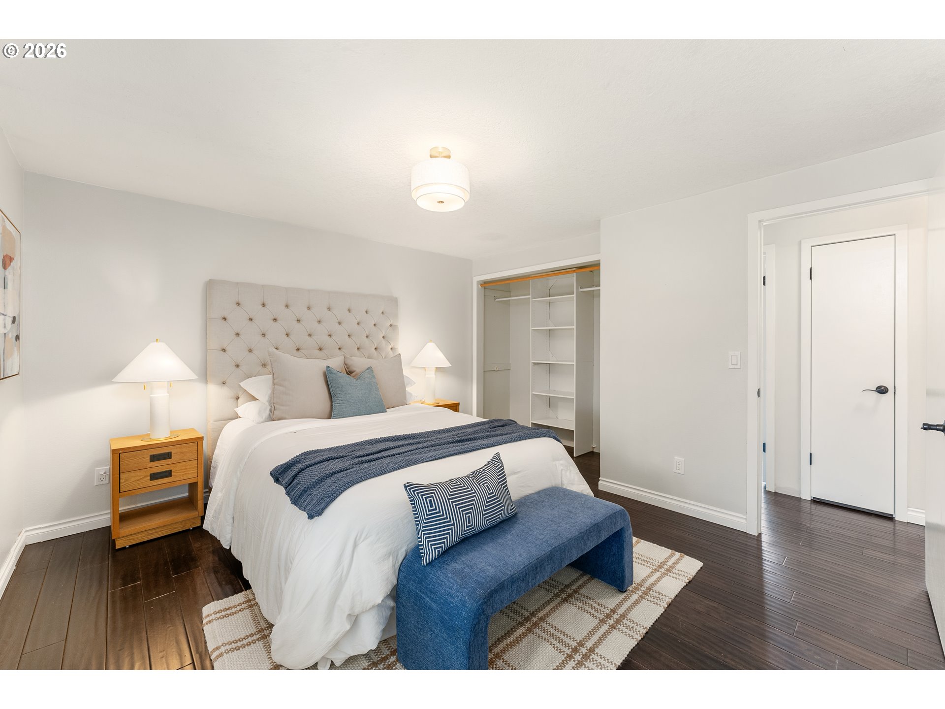12785 Southwest Percheron Lane Beaverton, OR 97008 - Photo 6 of 42 a bedroom with a bed and a night stand
