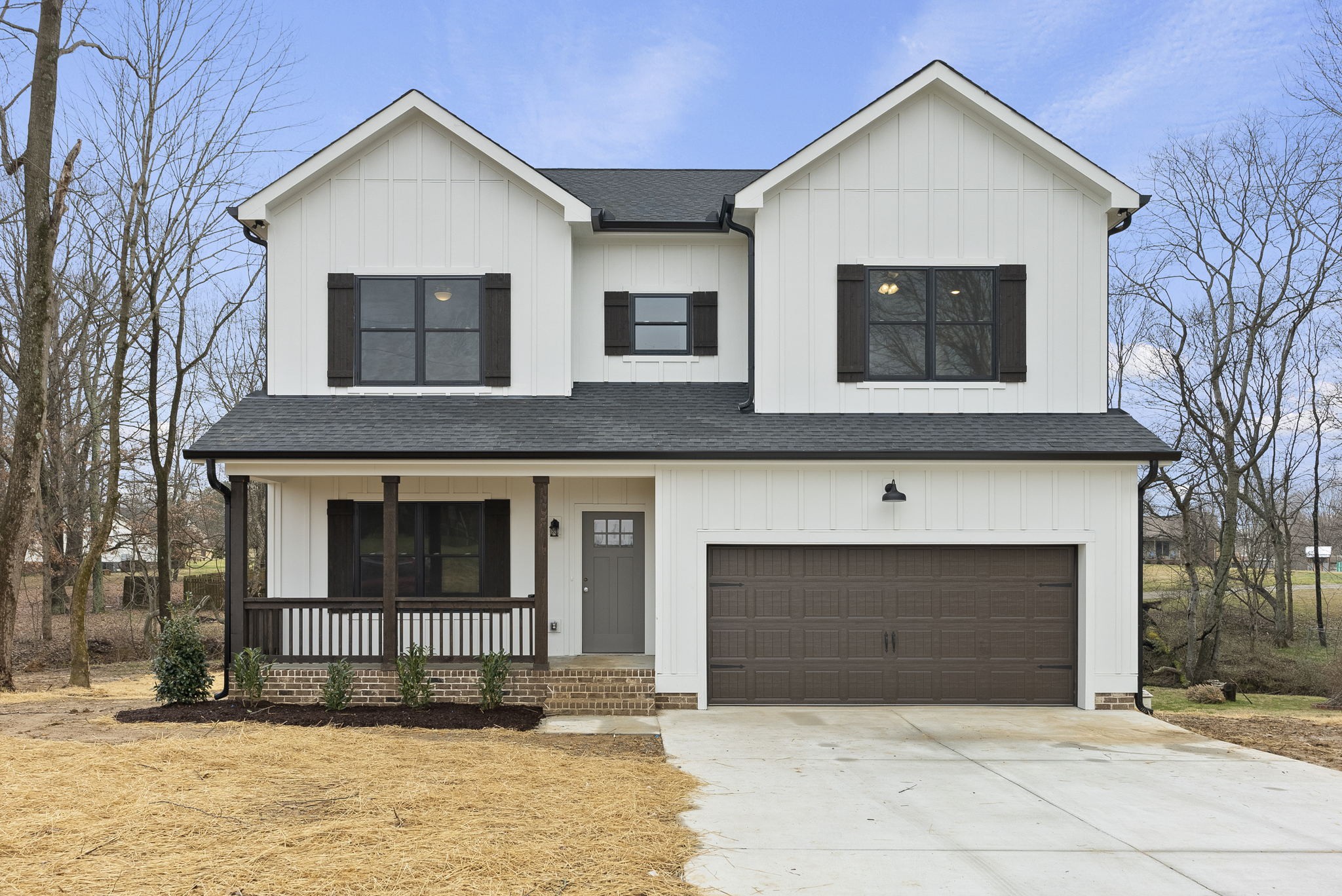 3472 Maxie Jones Road Springfield, TN 37172 - Photo 1 of 36 a front view of a house with a yard and garage