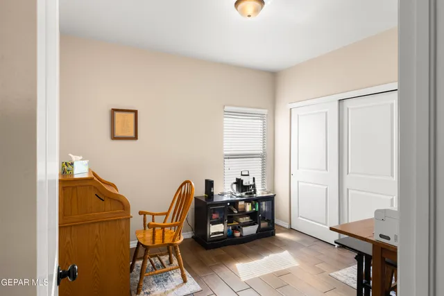 a room with furniture and a window