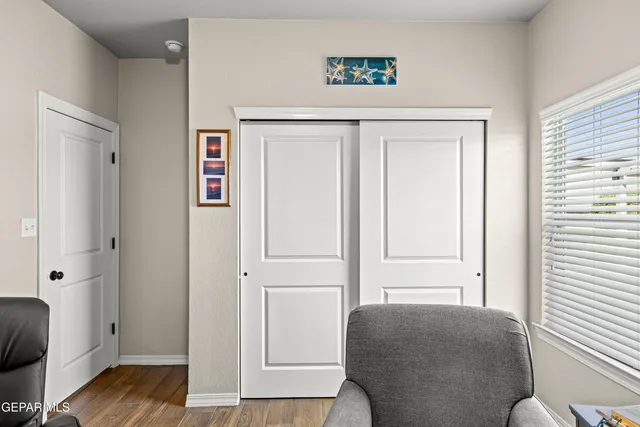 a living room with furniture and a window