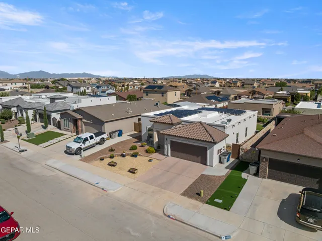 an aerial view of a house with sitting space