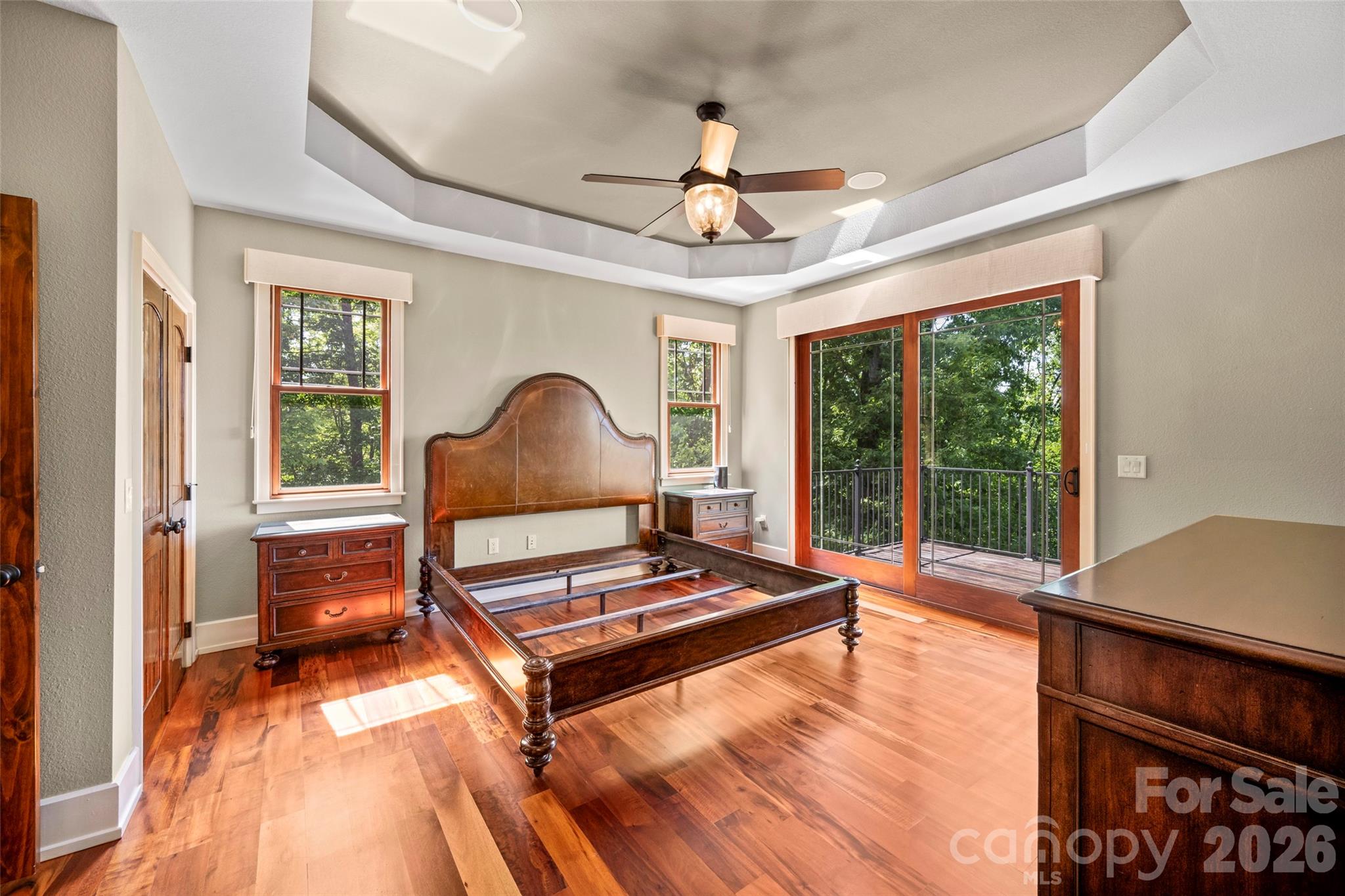556 High Pines Loop Lake Lure, NC 28746 - Photo 19 of 46 a living room with furniture a window and a chandelier