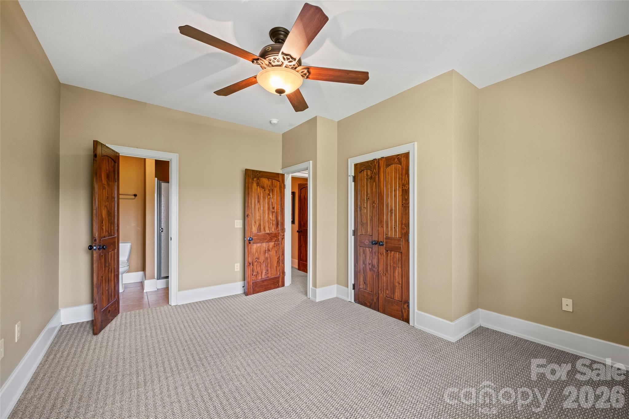 556 High Pines Loop Lake Lure, NC 28746 - Photo 30 of 46 a view of a livingroom with a ceiling fan