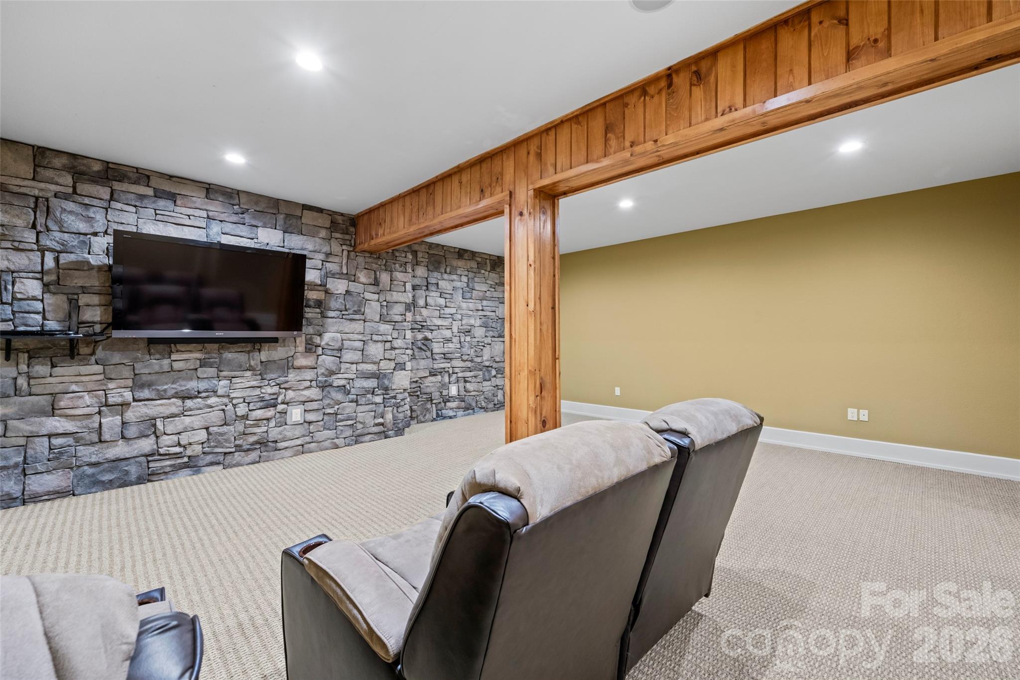 556 High Pines Loop Lake Lure, NC 28746 - Photo 37 of 46 a living room with furniture and a flat screen tv