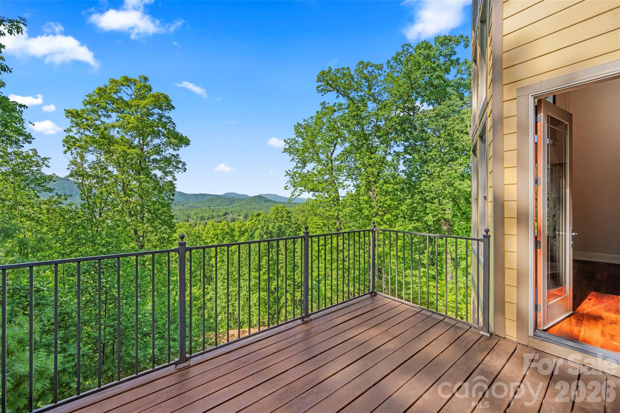 556 High Pines Loop Lake Lure, NC 28746 - Photo 41 of 46 a view of balcony with wooden floor