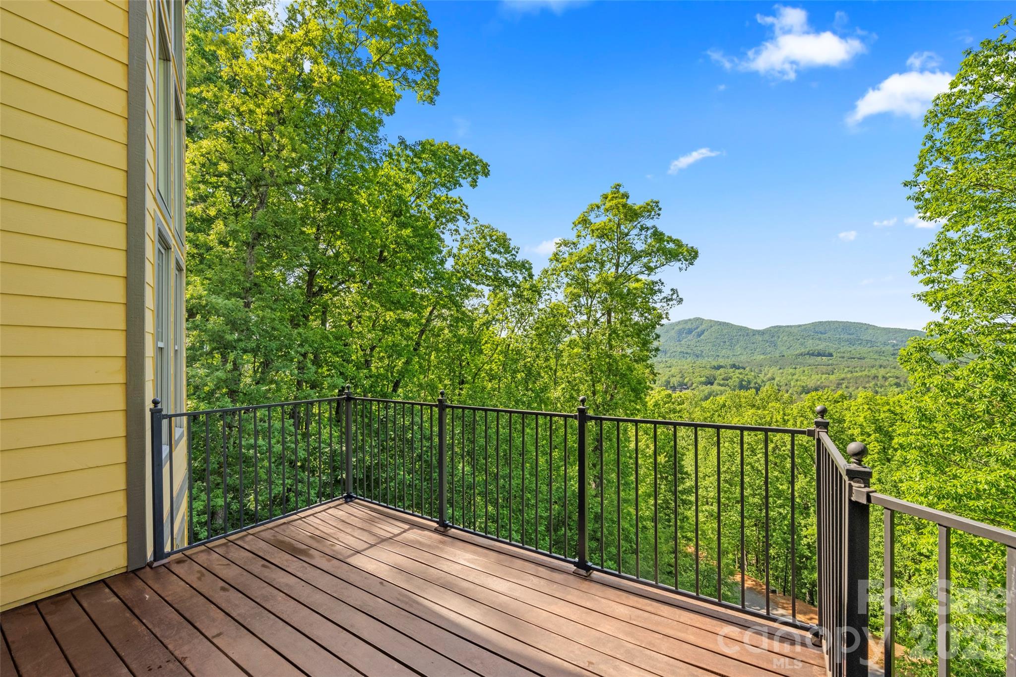 556 High Pines Loop Lake Lure, NC 28746 - Photo 42 of 46 a view of balcony with wooden floor