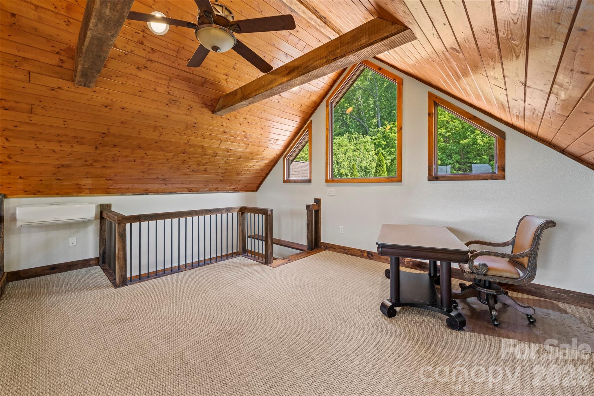 556 High Pines Loop Lake Lure, NC 28746 - Photo 9 of 46 a roof deck with table and chairs and wooden floor