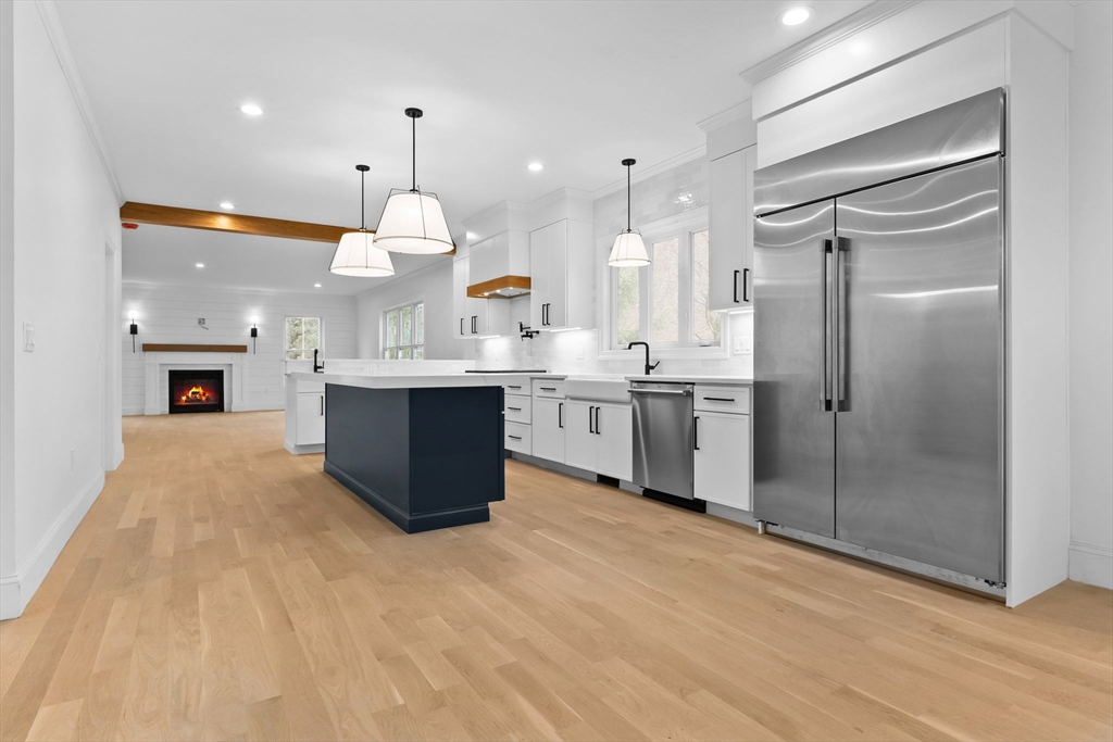 11 Couture Way Middleton, MA 01949 - Photo 4 of 24 a large kitchen with a sink stainless steel appliances and cabinets