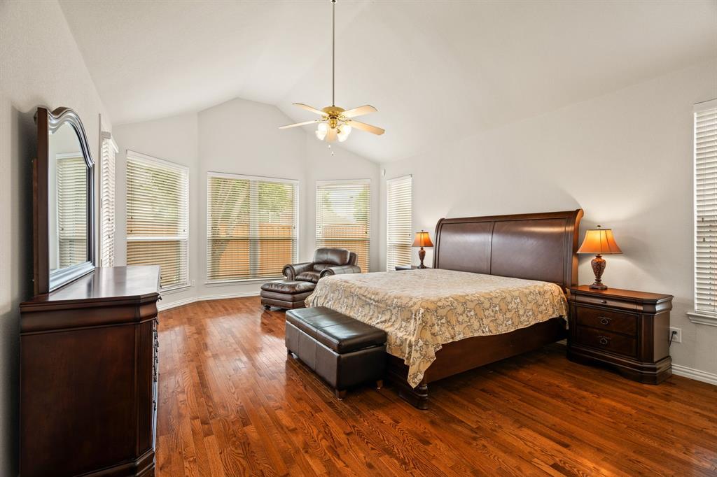 2012 Burnside Drive Allen, TX 75013 - Photo 14 of 40 a bedroom with a bed dresser and a window