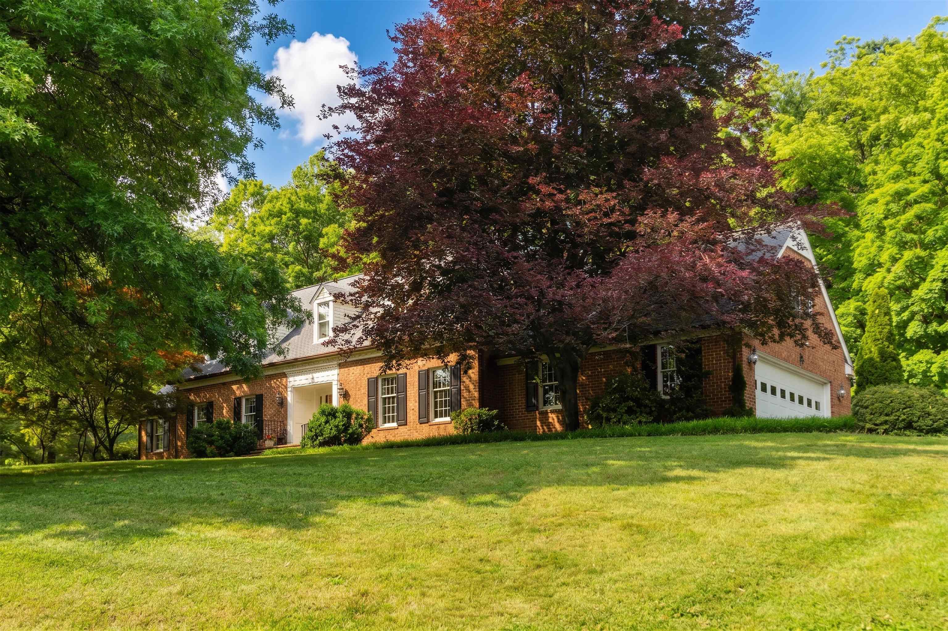 1430 Dogwood Road Staunton, VA 24401 - Photo 3 of 68 a front view of a house with a garden