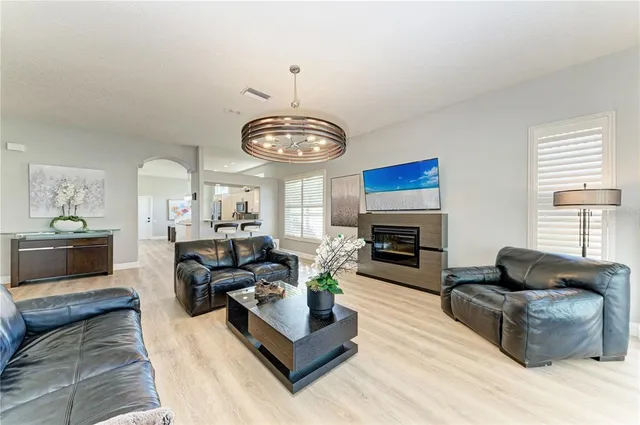 a living room with furniture and a rug