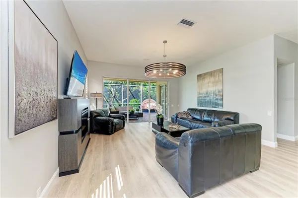 a kitchen with stainless steel appliances a stove a microwave and cabinets